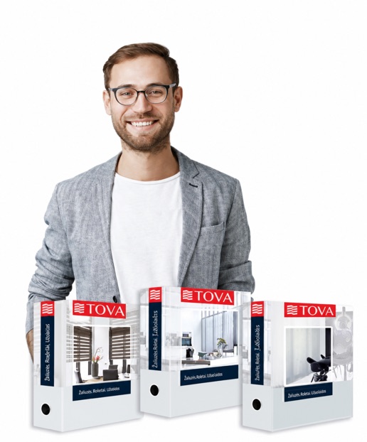 TOVA consultant holding window covering catalogues